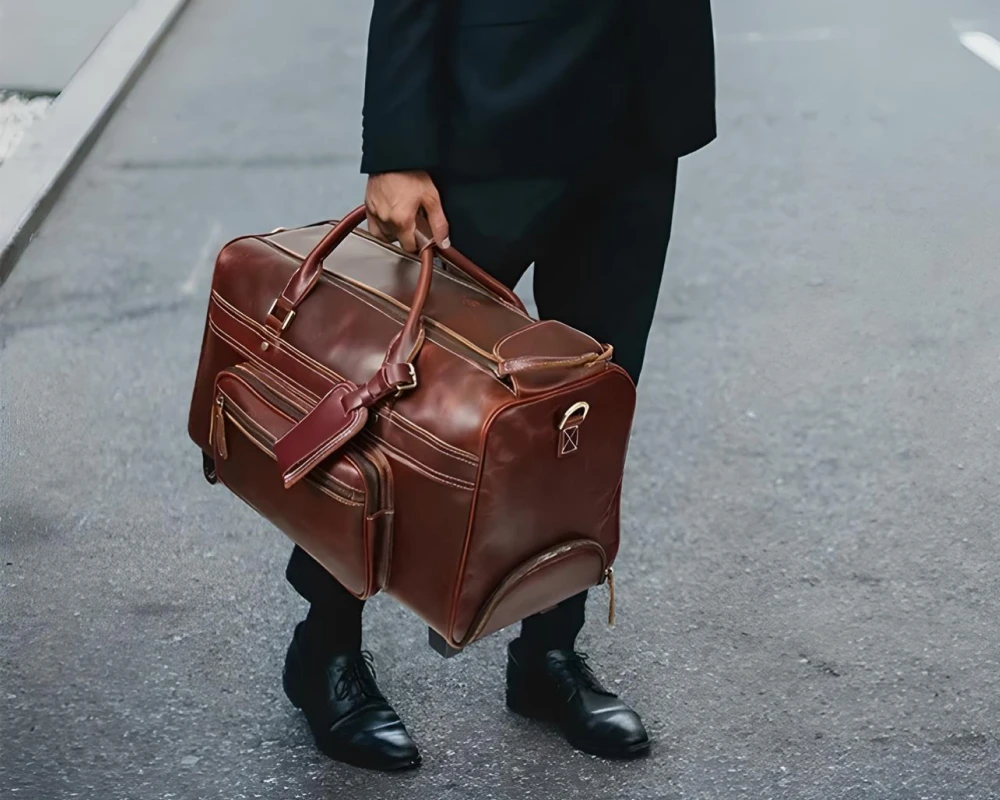 leather luggage with wheels